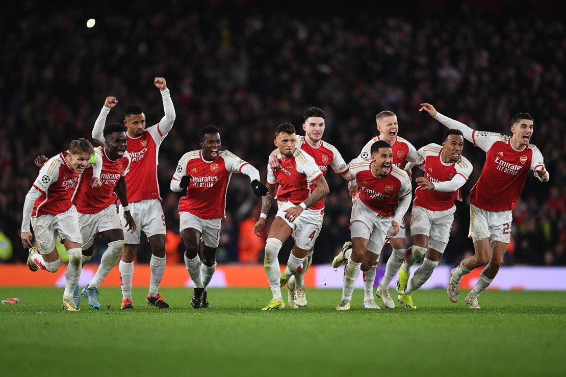 Arsenal celebrating a penalty shootout win